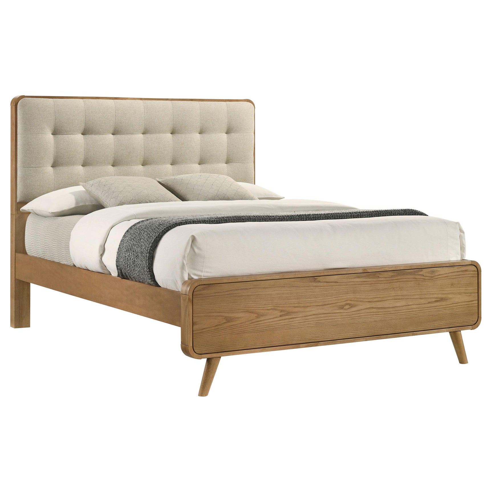 Close-up of upholstered headboard with square tufting