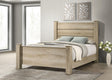 Side view of Oakglen Eastern King Panel Bed showing sturdy legs