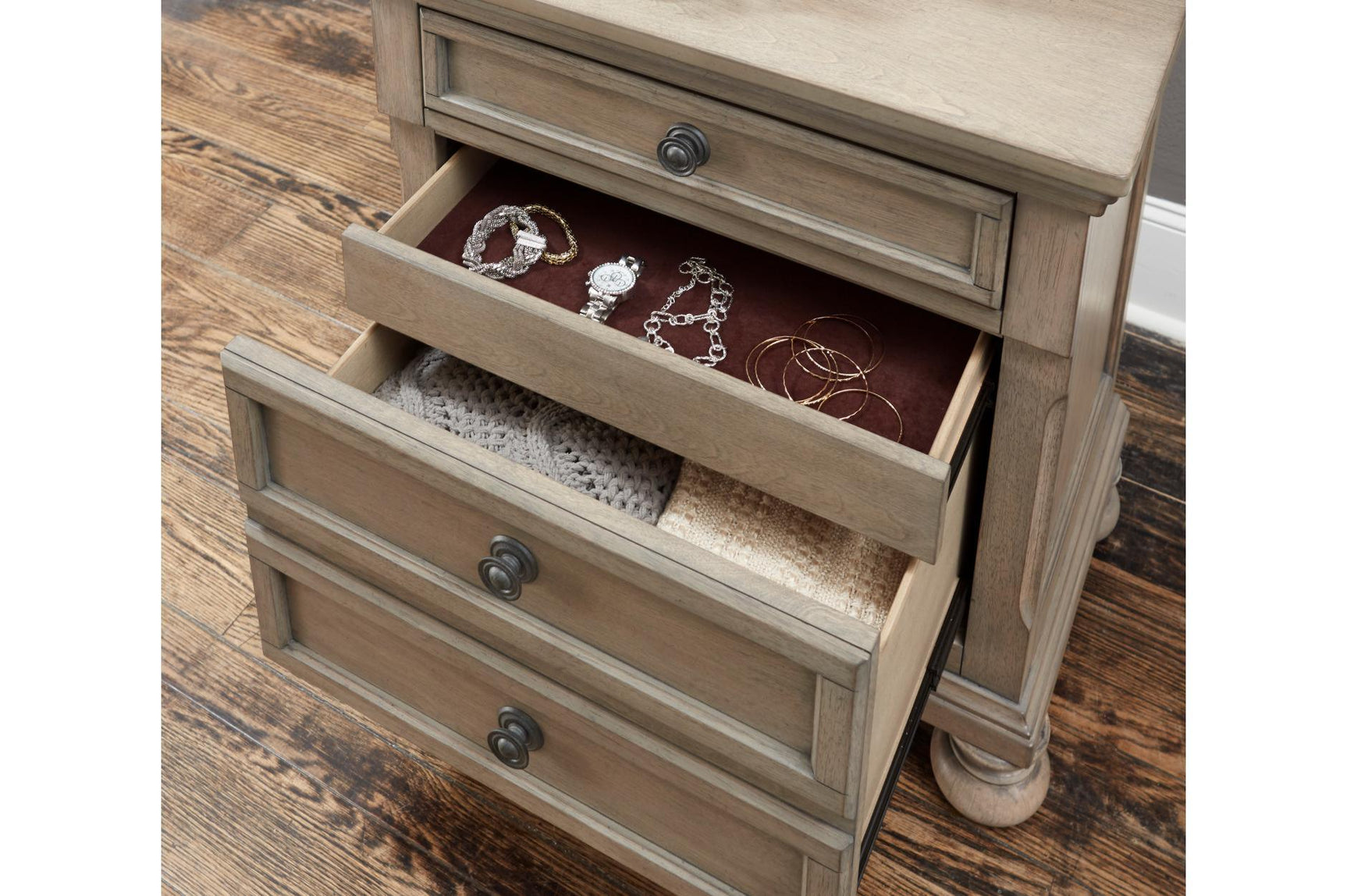 Close-up of Bethel Gray bed storage drawers