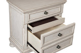 Close-up of hidden drawer in Bethel bedroom set