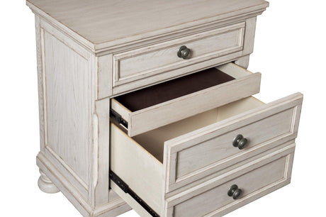 Close-up of hidden drawer in Bethel bedroom set