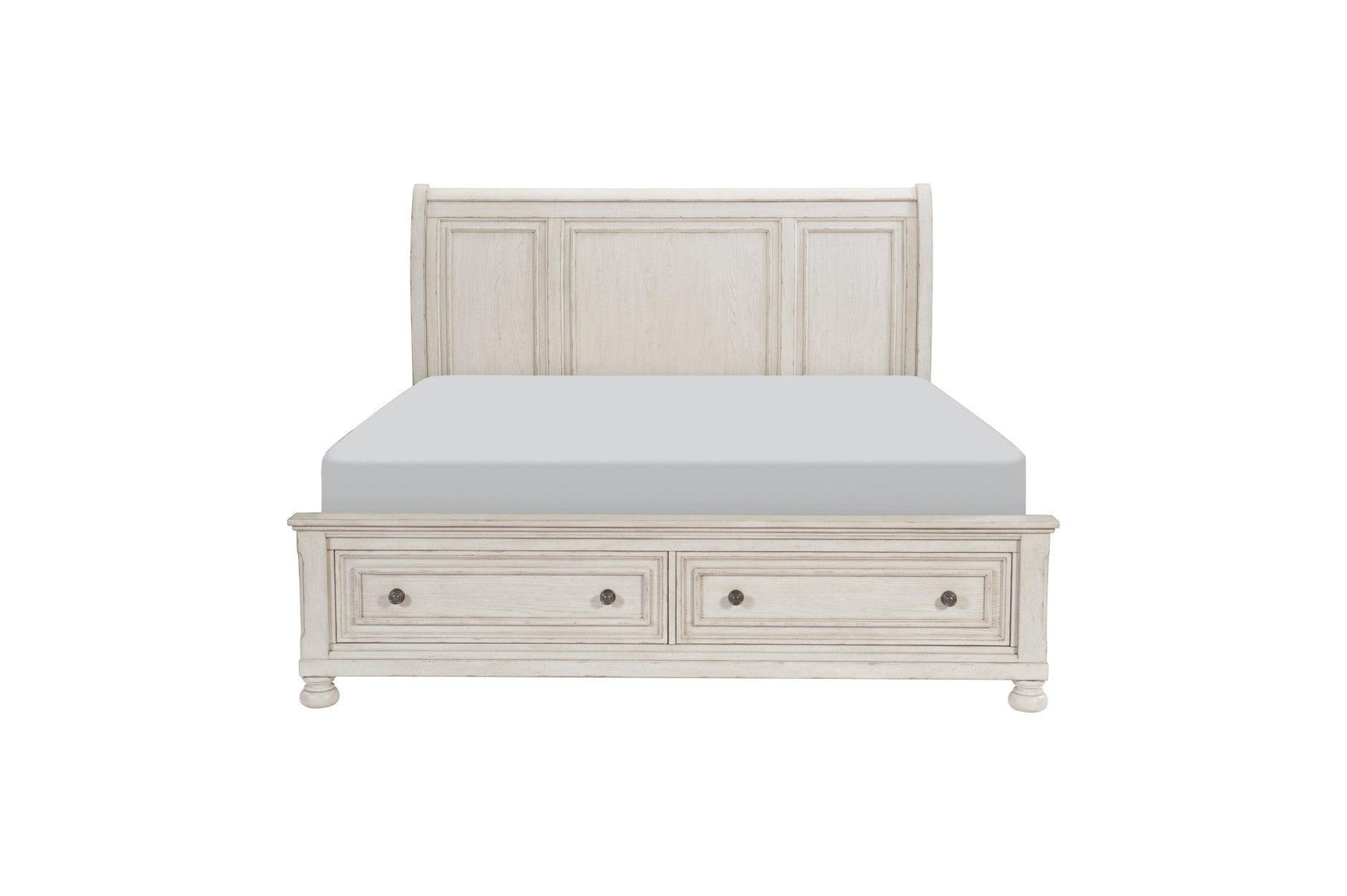 Side view of Bethel Antique White Sleigh Storage Bedroom Set bed