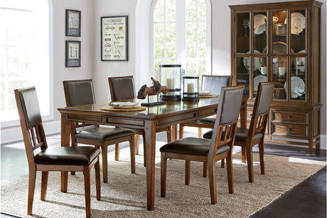 Frazier Park dining room set main view with rectangular table and brown faux leather chairs
