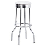 Side view of 1950s style round bistro table with chrome pedestal