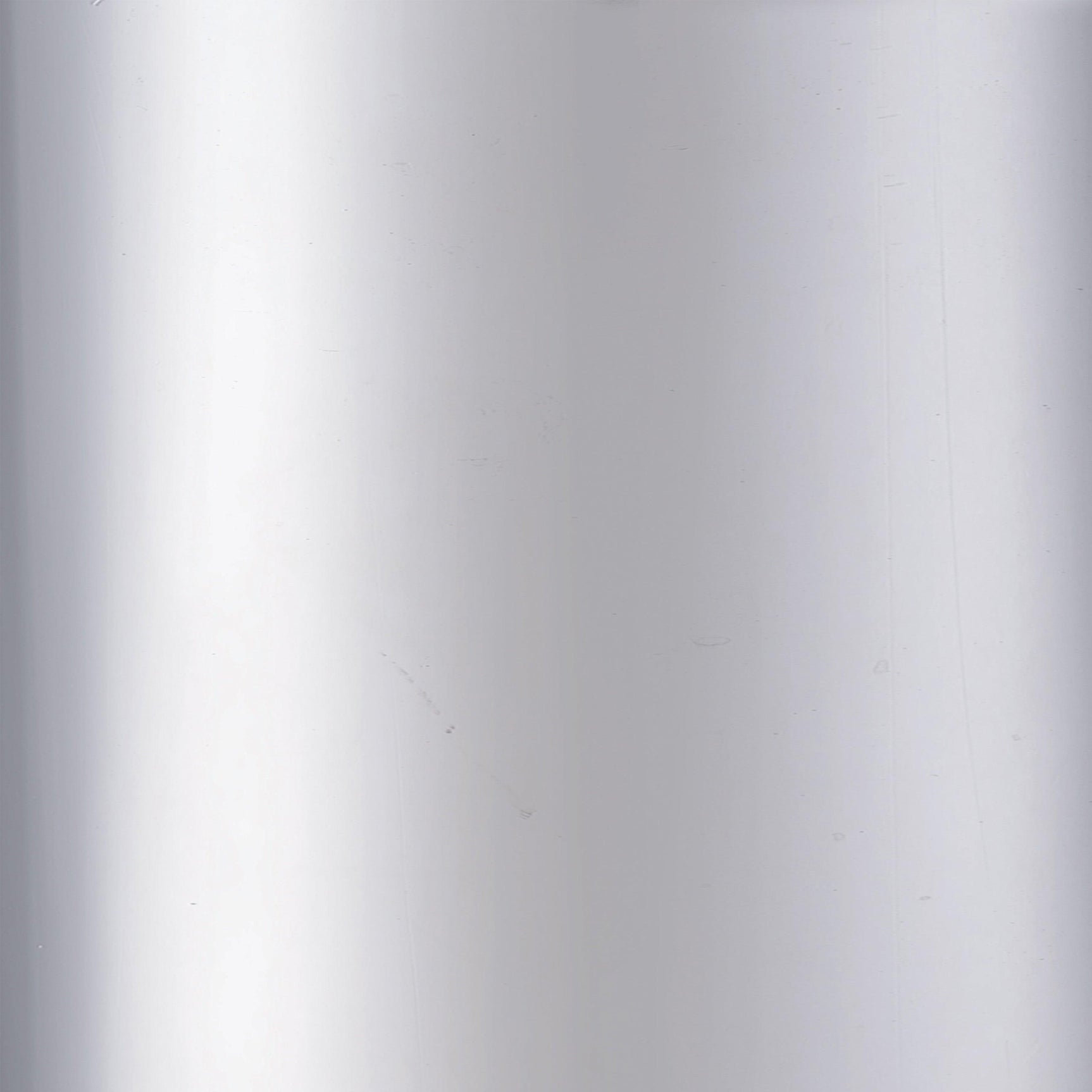 Top-down view of the Theodore Round Bar Table white gloss surface