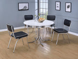 Dining table with chrome rim and metal legs from side angle