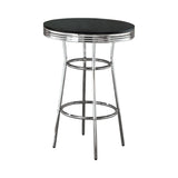 Side angle of Theodore Round Bar Table showing chrome footrest