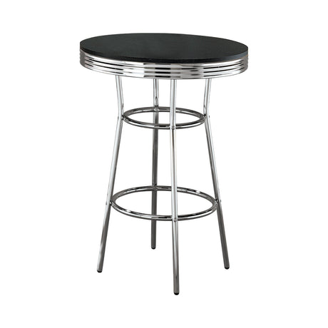 Side angle of Theodore Round Bar Table showing chrome footrest
