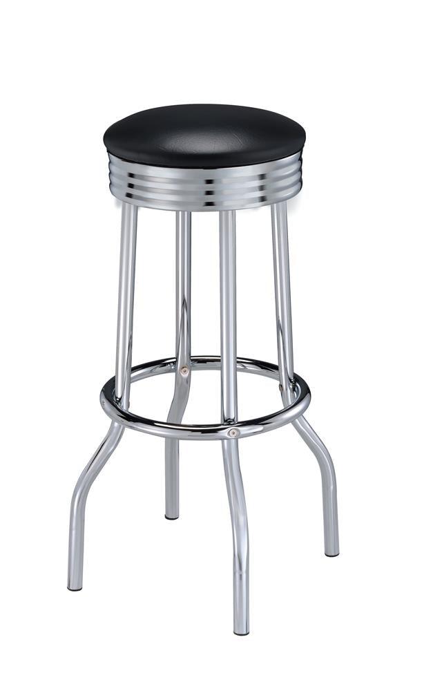 Side view of Theodore black cushioned bar stool with chrome frame