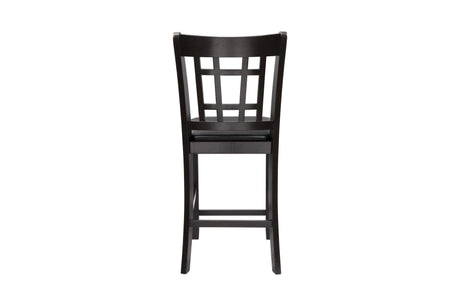 back view of Junipero Dark Cherry Oval Dining Room Set chairs and table
