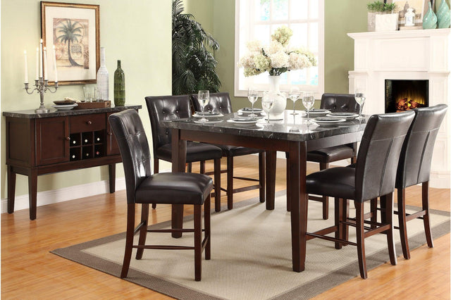 Dining table and four tufted faux leather chairs front view