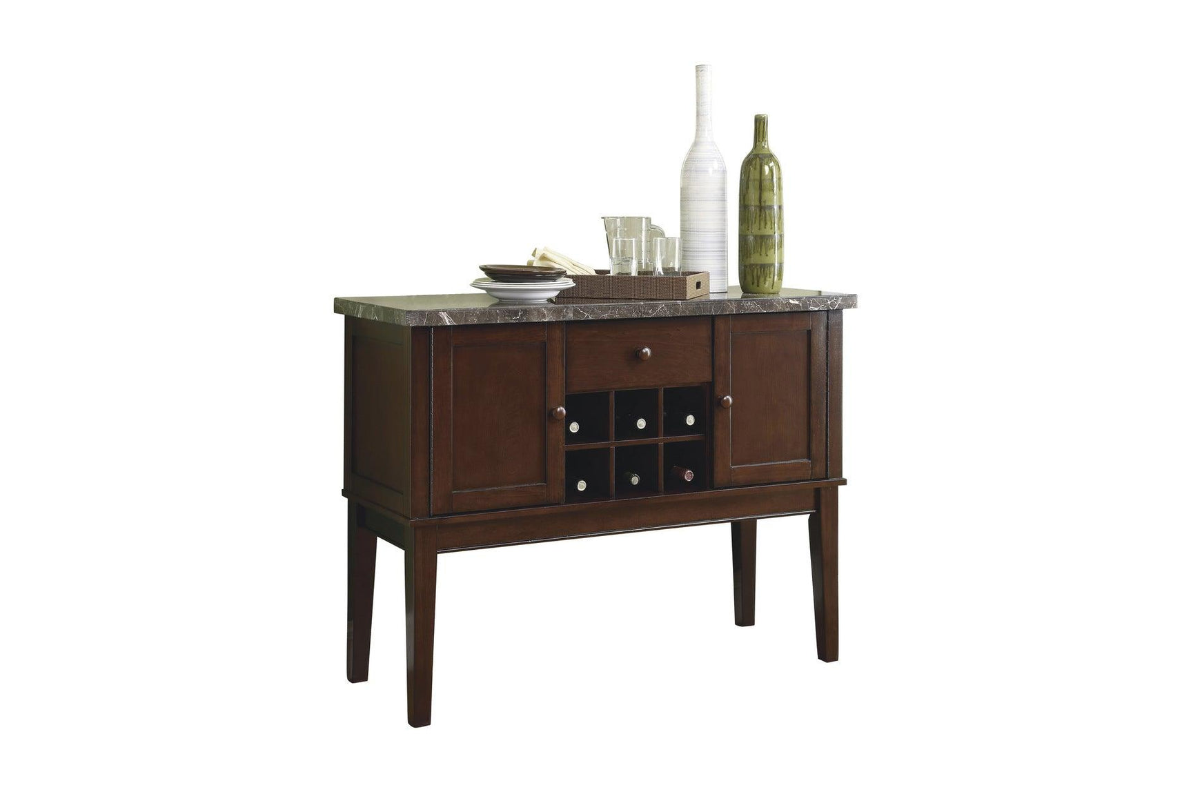 Dining set arranged in staged room setting