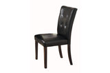 Detail view of tufted upholstery on espresso faux leather chair