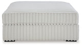 side angle showing Ottoman and sectional sofa