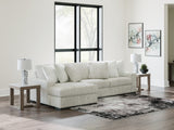 Side angle showing sectional sofa layout with chaise