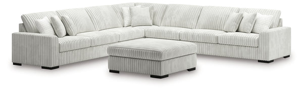 side view of Stupendous Alloy 5-Piece Sectional Sofa with Ottoman