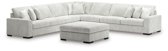 side view of Stupendous Alloy 5-Piece Sectional Sofa with Ottoman