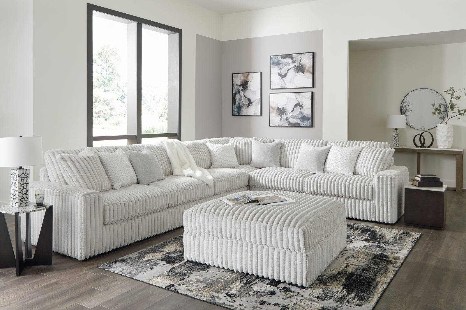 main view of Stupendous Alloy 4-Piece Sectional with Ottoman sectional sofa