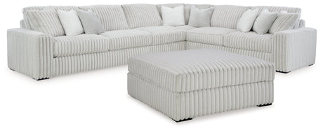 side view of Stupendous Alloy 4-Piece Sectional Sofa with Ottoman sectional sofa