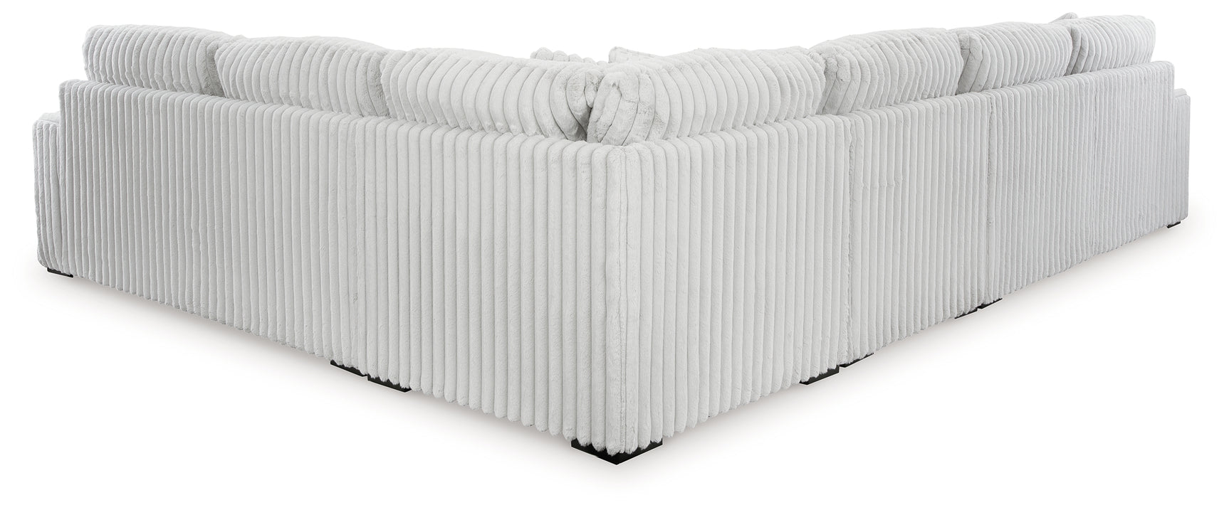 room view showing Stupendous Alloy 4-Piece Sectional with Ottoman sofa