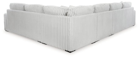 room view showing Stupendous Alloy 4-Piece Sectional with Ottoman sofa