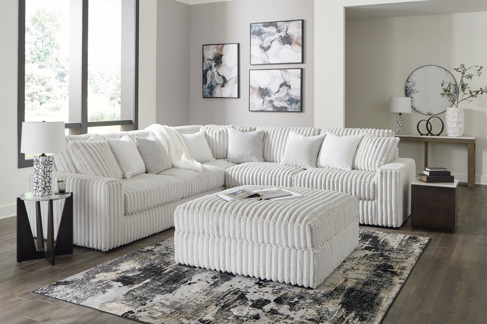 main view of Stupendous Alloy 3-Piece Sectional with Ottoman sectional sofa