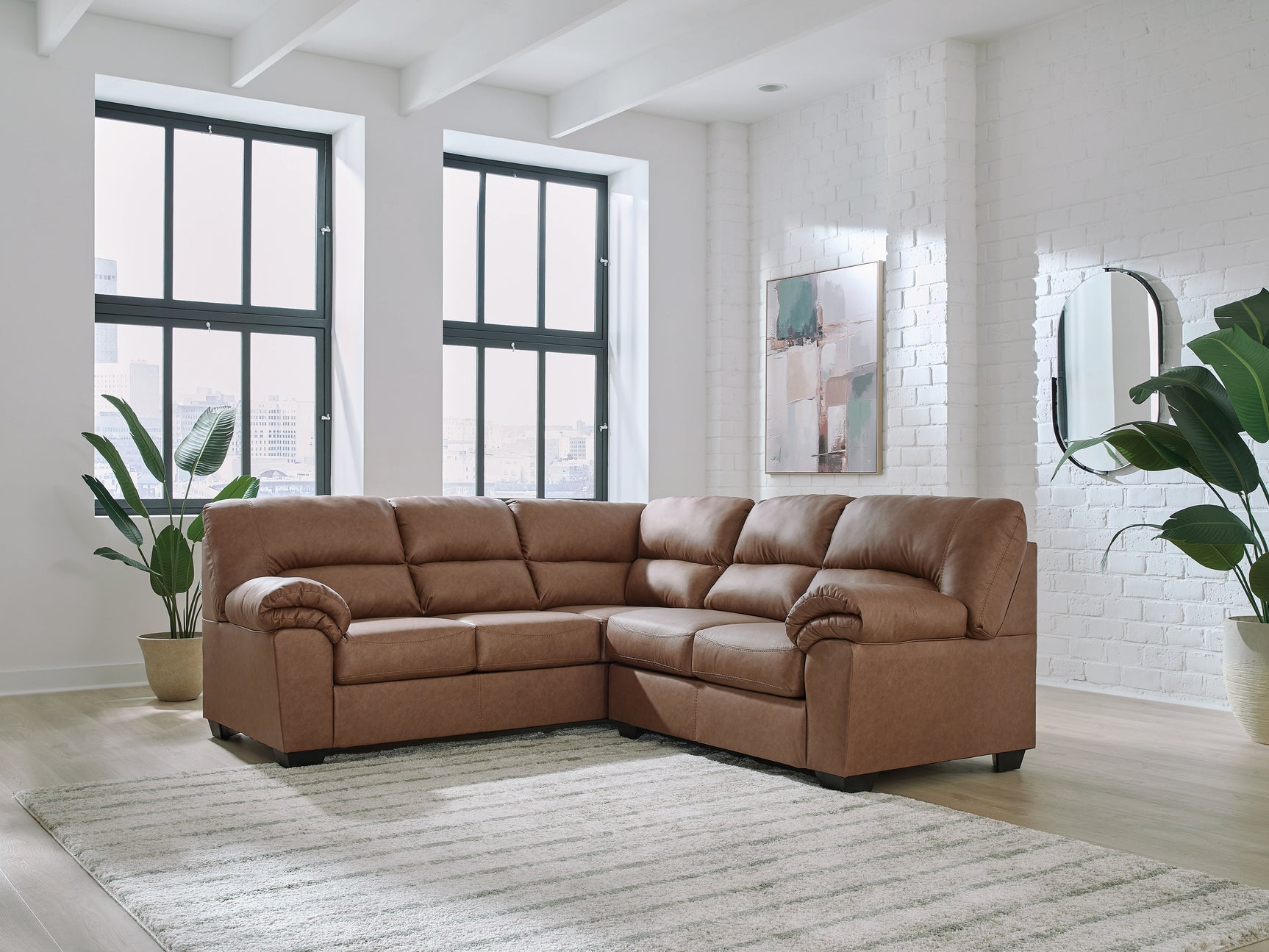 WillowBend Caramel Faux Leather 2-Piece Sectional sofa front angle