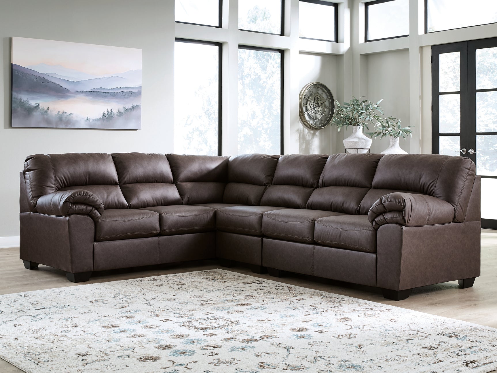 Room placement with WillowBend Umber faux leather sectional sofa