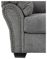 Detail of chenille upholstery texture on loveseat arm