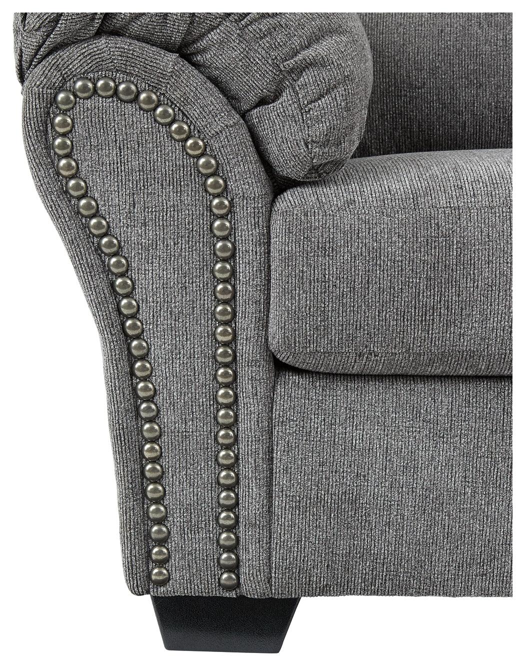 Detail of chenille upholstery texture on loveseat arm