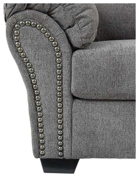 Detail of chenille upholstery texture on loveseat arm