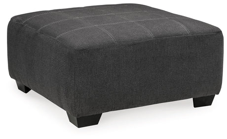 Side angle of Ambee Slate sectional sofa with ottoman
