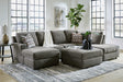 Room view with sectional sofa and ottoman