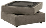 Ottoman underside showing built-in tabletop and cup holders