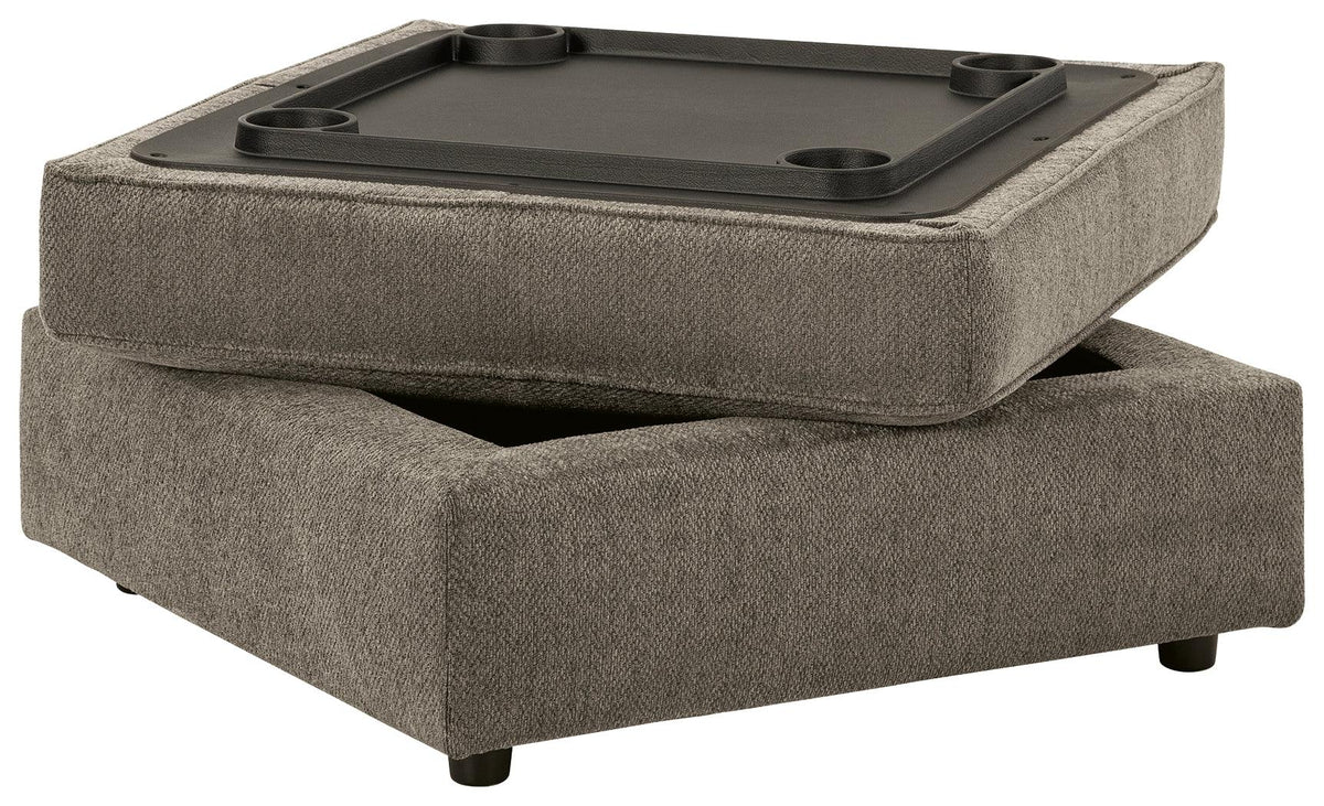 Ottoman underside showing built-in tabletop and cup holders