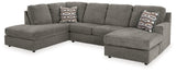 Side view showing putty upholstery and chaise section