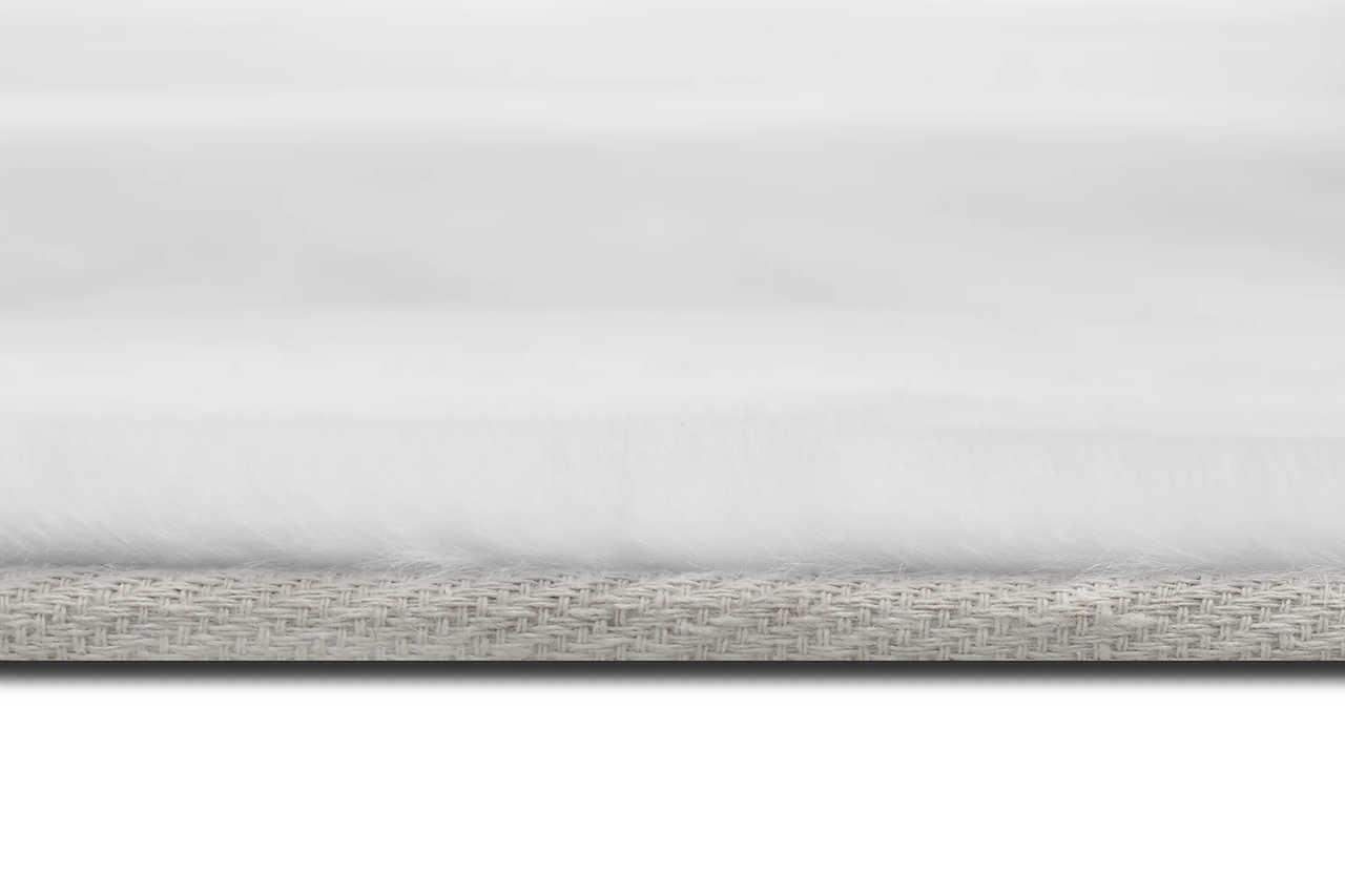 Rabbit Pure White Art Silk Shine Rug in a living room setting