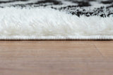 Top view of 5x7 black and white shag area rug