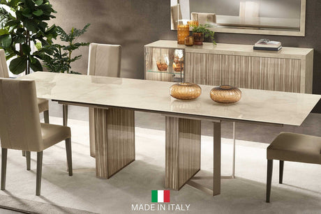 Luce Italian dining table with 2 extensions viewed from front angle