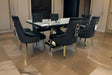 Viva rectangular dining table in black and gold with marble-like surface, angled front view