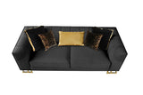 Back angle of black velvet chair with gold legs