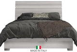 Side angle of Mia Light Gray Nightstand showcasing storage drawers