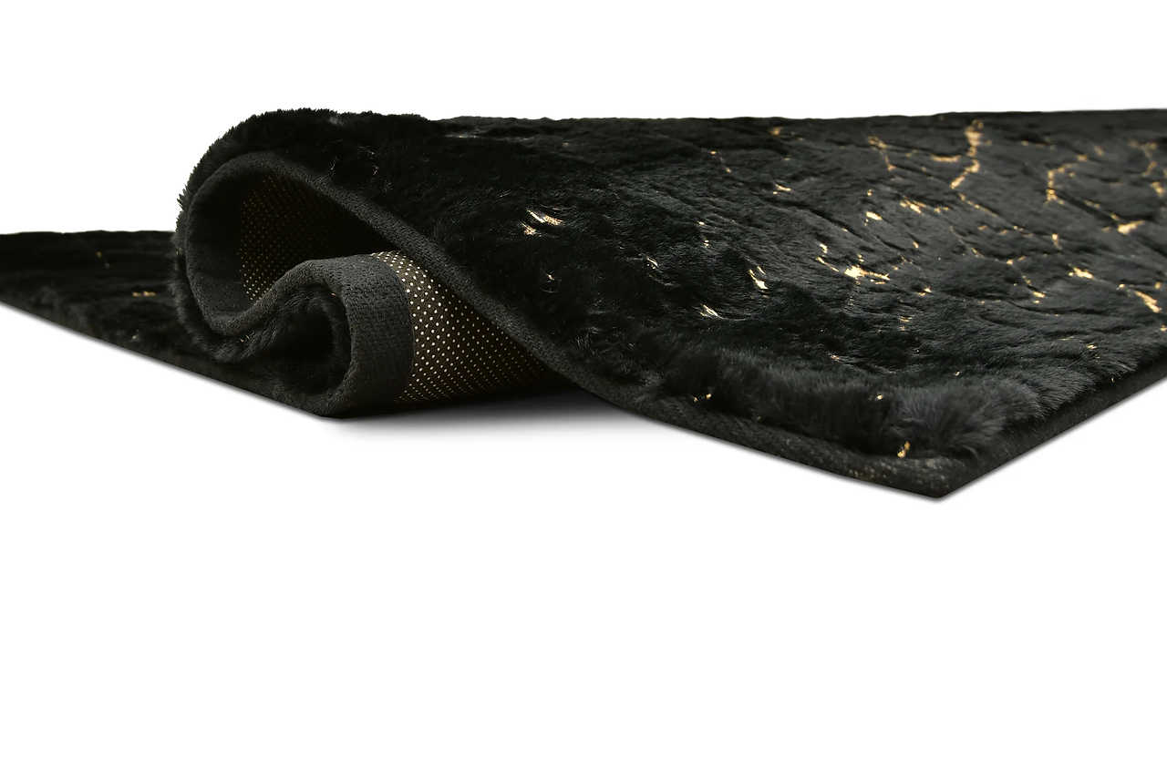 Rabbit Black Gold medium rug 5x7 angled view