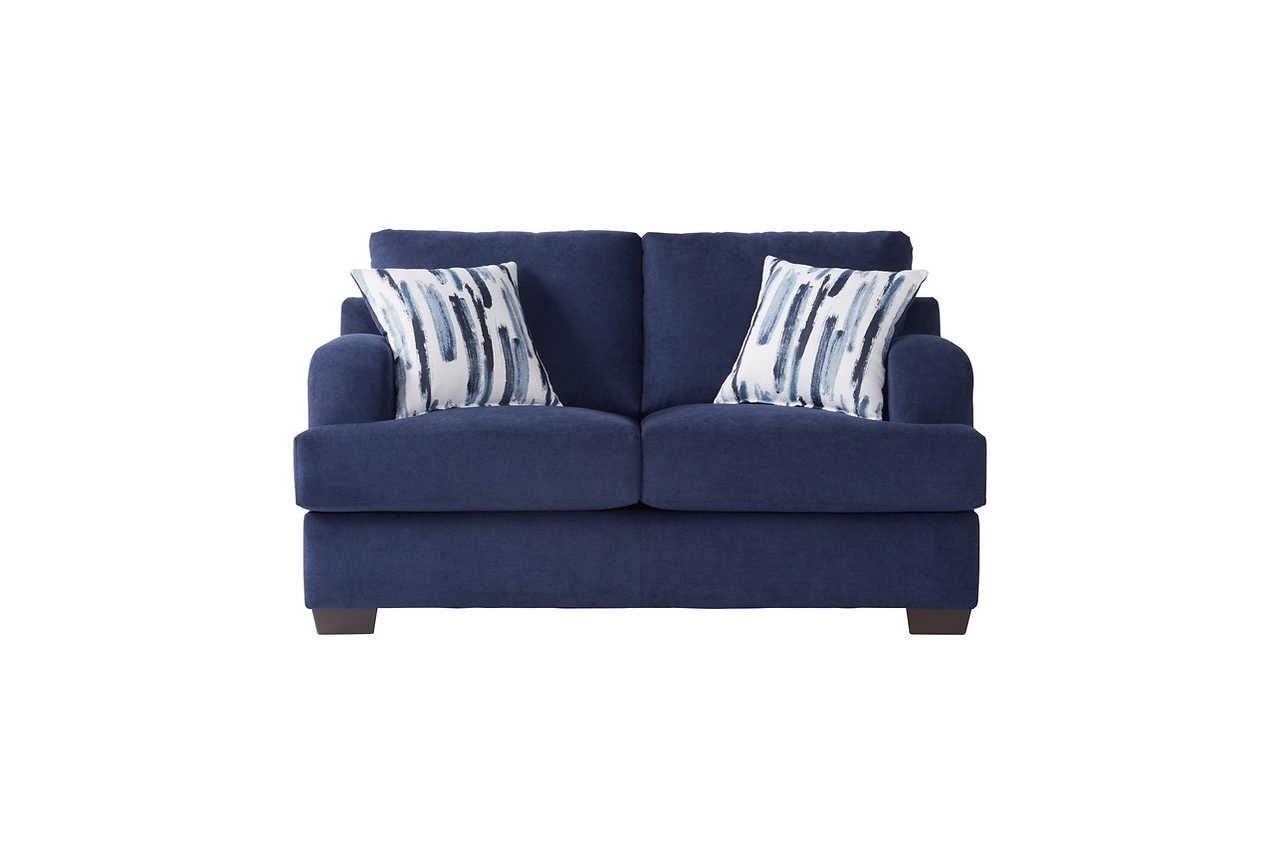Close-up detail of navy blue velvet fabric on Cameo Sofa