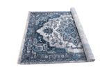 Ashton Glacier 5x7 teal blue rug corner fold