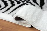 Close-up of plush black and white shag texture rug