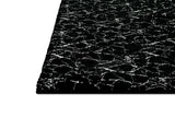 Decorative styling of Rabbit Black and Silver rug in room setting