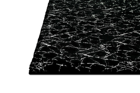 Decorative styling of Rabbit Black and Silver rug in room setting