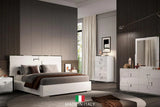 Side angle of Infinity White 2-Drawer Nightstand highlighting shelf and drawer hardware