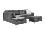 Detail close-up of tufted velvet upholstery and nailhead trim on Joy sectional